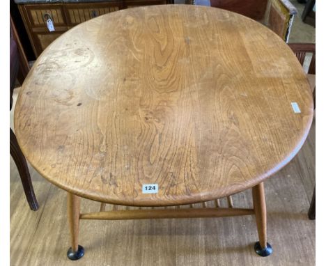 An Ercol light elm and beech oval coffee table, width 99cm, depth 82cm, height 45cm