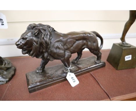 Barye. A bronze lion, width 36cm height 22cm