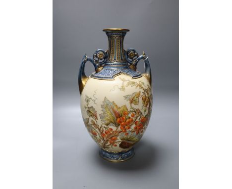 A Royal Worcester porcelain two-handled vase, the bulbous body painted with fruit and foliage, height 31cm, shape 1200