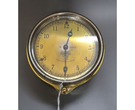 An early 20th century Smith's brass automobile timepiece, diameter 9cm