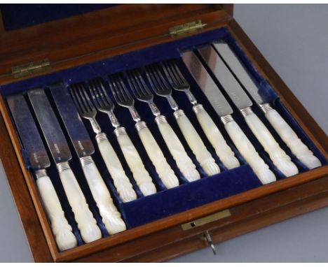 A Victorian cased set of twelve pairs of mother of pearl handled silver fruit eaters, by Francis Higgins II, London, 1857.CON