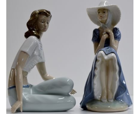 A LARGE 11¼" NAO PORCELAIN FIGURINE ORNAMENT - A YOUNG LADY CLUTCHING HER SCARF, TOGETHER WITH ANOTHER LARGE 10" NAO PORCELAI