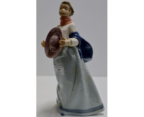 A LARGE 12½" NAO PORCELAIN FIGURINE - A YOUNG LADY WITH WIND SWEPT HAIR CLUTCHING HER HAT, REG 1295     