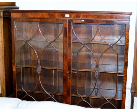 MAHOGANY DOUBLE DOOR BOOKCASE ON BRACKET FEET     
