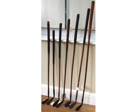 Seven Hickory Shafted Golf Clubs to include Tom Stewart smooth faced cleek; Anderson of Anstruther (arrow cleek) offset smoot