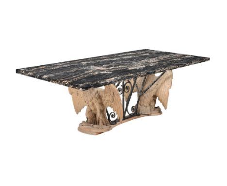 A MARBLE TOPPED DINING TABLE  20TH CENTURY The black marble veneered top above a wrought iron frame and with carved softwood 