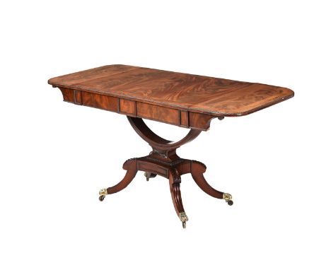 A REGENCY MAHOGANY AND CROSSBANDED SOFA TABLE CIRCA 1820, IN THE MANNER OF GILLOWS With a pair of blind frieze drawers 73cm h