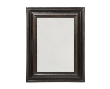 A DUTCH EBONISED WALL MIRROR IN 17TH CENTURY STYLE  19TH CENTURY 134cm high, 102cm wide  Condition Report:  As catalogued thi