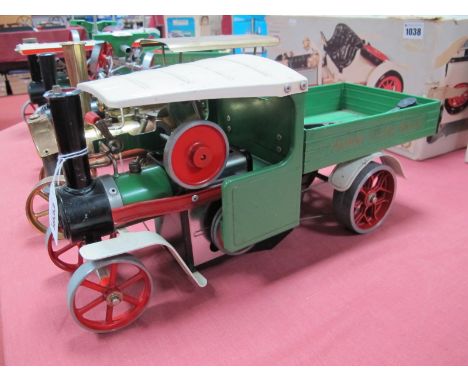 A Mamod Live Steam "Steam Wagon", unboxed, very good condition, appears light steamed only, finished in green with cream cano