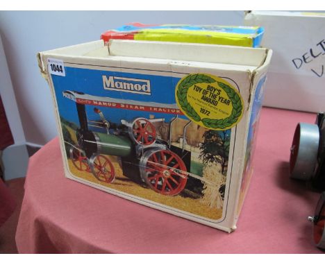A Mamod Boxed TEI Live Steam Tractor, in good light steamed condition, complete with burner, steering rod and funnel, box fai