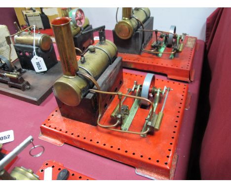 A Mamod SE3 Live Steam Engine,  6 x 2 inch copper boiler, connected to a twin cylinder flywheel and mounted on a 9 x 10 inch 