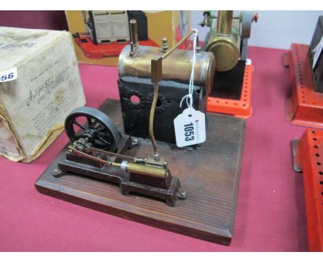 An Enthusiast Built Live Steam Engine, with a 1½ x 4 inch copper boiler, connected to a single cylinder and 2 inch flywheel, 