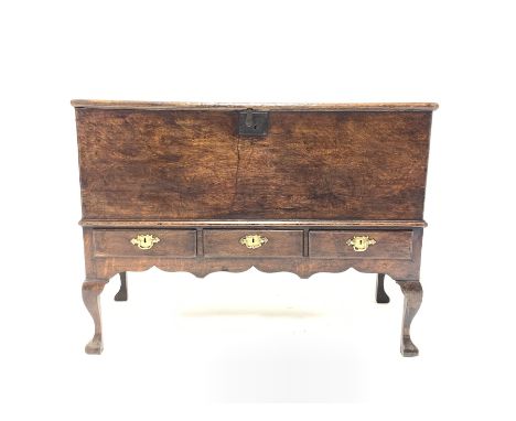 Late 18th century oak mule chest, hinged top revealing interior fitted with candle tray and three small drawers, raised on ca