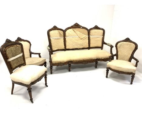 Late Victorian rosewood four piece salon suite, comprising a three seat sofa with acanthus carved crest rail and incised scro