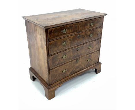 18th century walnut chest, cross banded top over two short and three long graduated drawers with herringbone inlay, raised on