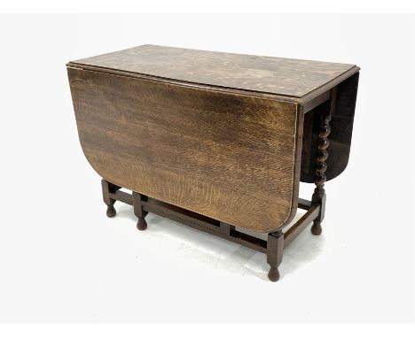 Early 20th century oak gate leg drop leaf dining table, the moulded top raised on spiral turned supports  - Condition Report 