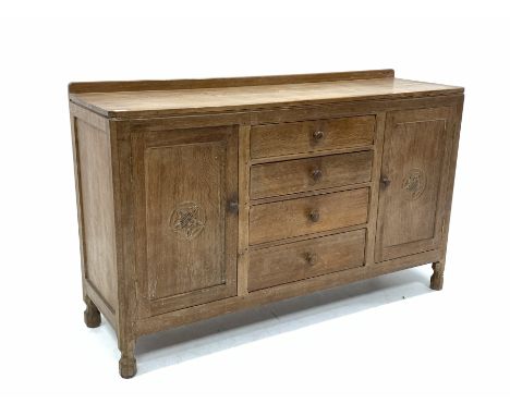 Wilf 'Squirrelman' Hutchinson of Husthwaite - Yorkshire oak sideboard, raised on over rectangular top with canted corners, ba