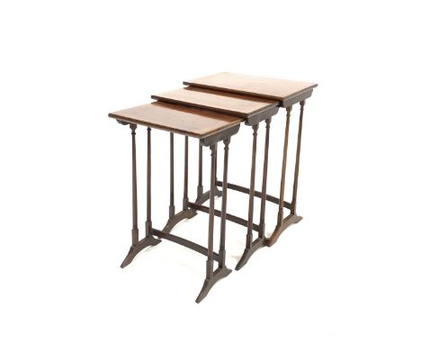 Georgian style mahogany nest of three tables, each top with box wood string inlay, raised on slender ring turned supports ter