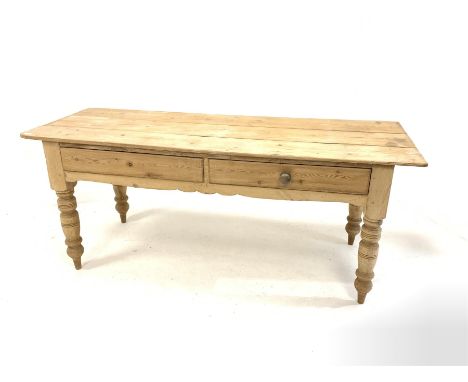 Victorian pine kitchen side table, fitted with two drawers over shaped apron, raised on turned supports  - Condition Report 