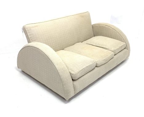 Art Deco style three seat sofa, with unusual convex back rest, three loose cushions, upholstered in natural linen, raised on 