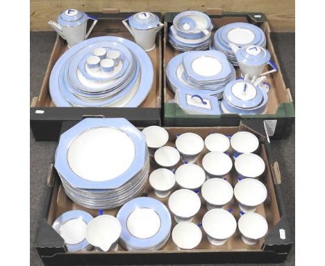 An extensive Palissy Art Deco tea and dinner service, with blue and gilt borders, to include serving plates, teapots and cups