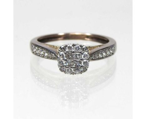 A diamond cluster ring, of square set design, with diamond shoulders, unmarked tests 9 carat, 2.2g, size K