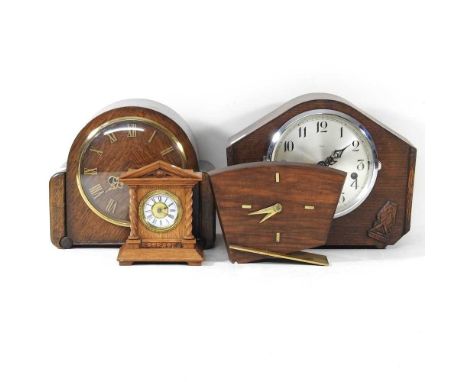 A 1920's oak cased mantel clock, together with three other clocks, highest 22cm (4)