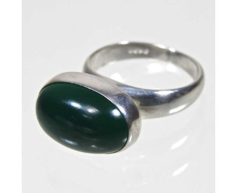 A Georg Jensen silver and green onyx ring, of oval shape, stamped marks, 8.4g, size N, approximately 17mm wide