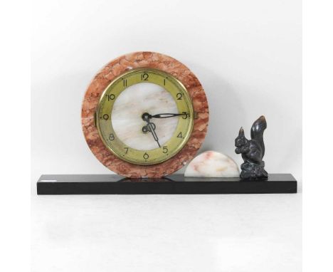 An Art Deco marble mantel clock, surmounted by a bronzed squirrel, on a plinth base, 23cm high