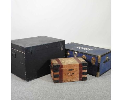 An early 20th century black painted trunk, together with a metal bound box bearing a label for Billings and Edmonds tailors a