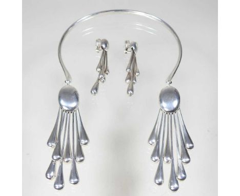 A rare Georg Jensen silver earring and necklace set, designed by Astrid Fog, circa 1971, no.235, comprising a neck ring, susp