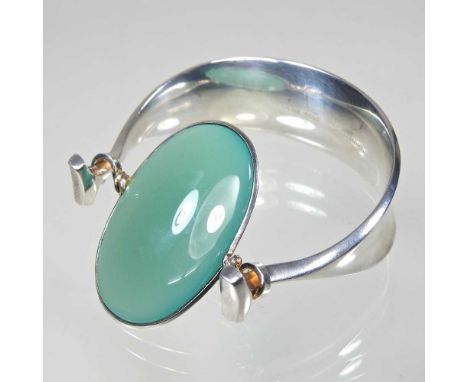 A Georg Jensen silver and green agate Dew Drop bangle, designed circa 1974, by Vivianna Torun Bulow-Hube, stamped and numbere