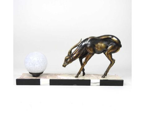 An Art Deco figural table lamp, surmounted by a deer and a glass shade, on a marble plinth base, 22cm high