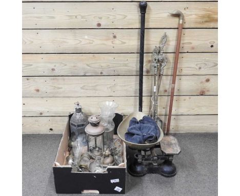 A collection of metal wares, to include lanterns, walking sticks, fire tools and a set of iron kitchen scales