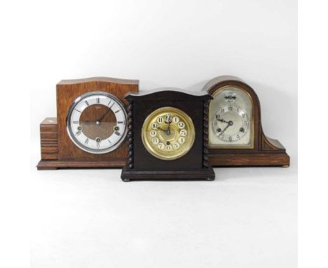 A 1920's Smiths mantel clock, with Westminster chimes, 23cm high, together with two other clocks (3)