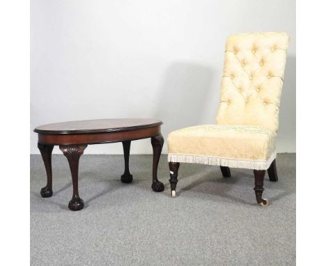 An early 20th century oval occasional table, 76cm wide, together with a Victorian rosewood button back chair (2)