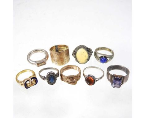 A 9 carat gold ring, in the form of a buckle, 4.2g, size P, together with a collection of silver and gem set dress rings (9)