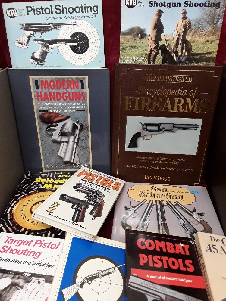 A collection of books for gun enthusiasts to include "Encyclopaedia of