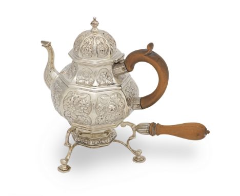 A George III silver teapot and burner standJohn Cope Folkard, London 1819 Curved octagonal, decorated with scrolling foliage,