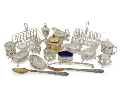 A collection of silver itemsvarious dates and makers Comprising: two toast racks; four sauce boats; two three-piece cruet set