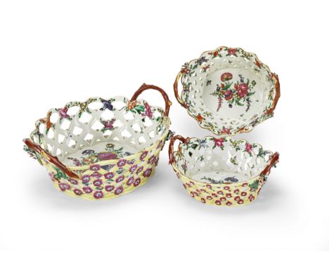 Three Worcester yellow-ground oval baskets, circa 1770Each interior base painted with a colourful floral spray, the exterior 