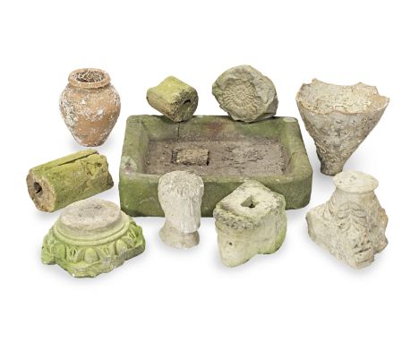 A collection of various architectural fragments and Roman plainware potteryIncluding a carved stone capital with egg and dart