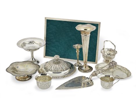 A collection of silver itemsvarious dates and makers Comprising: a trowel, London 1875; two vases; a cover; four bowls/dishes