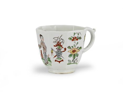 A Worcester octagonal coffee cup, circa 1753-4Painted with a single Chinese figure, vases, flowers and insects, with C-scroll