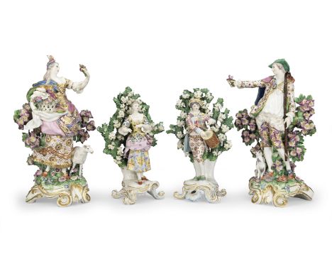 A pair of Chelsea figures of the 'Imperial Shepherds', circa 1765Both standing before bocage with one arm outstretched, their