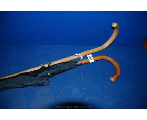 A Walking Stick and a gent's Umbrella.