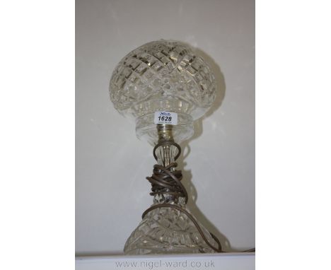 A cut glass electric Table Lamp, complete with matching glass globe.  15'' high