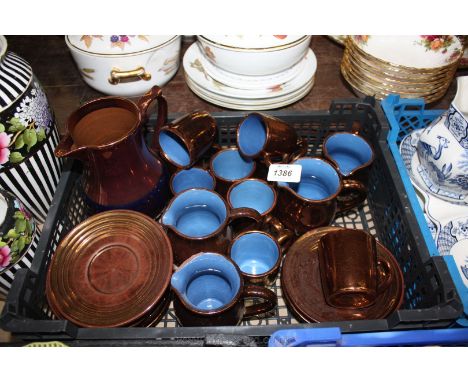 A quantity of Creigiau Welsh lustre Pottery including coffee cups and saucers and jugs plus a lustre Jug.