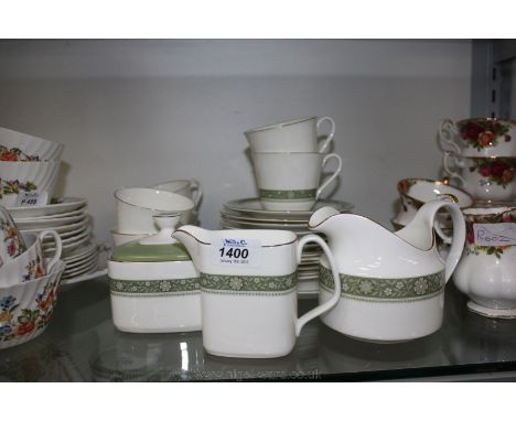 A Royal Doulton 'Rondelay' part Teaset including six Cups and saucers, six Tea Plates, Bread and Butter Plate, two Milk Jugs 