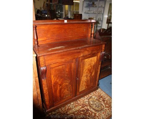 An early 19th c. Mahogany Chiffonier, having galley shelf back on single panel and turned supports, plain frieze drawer with 